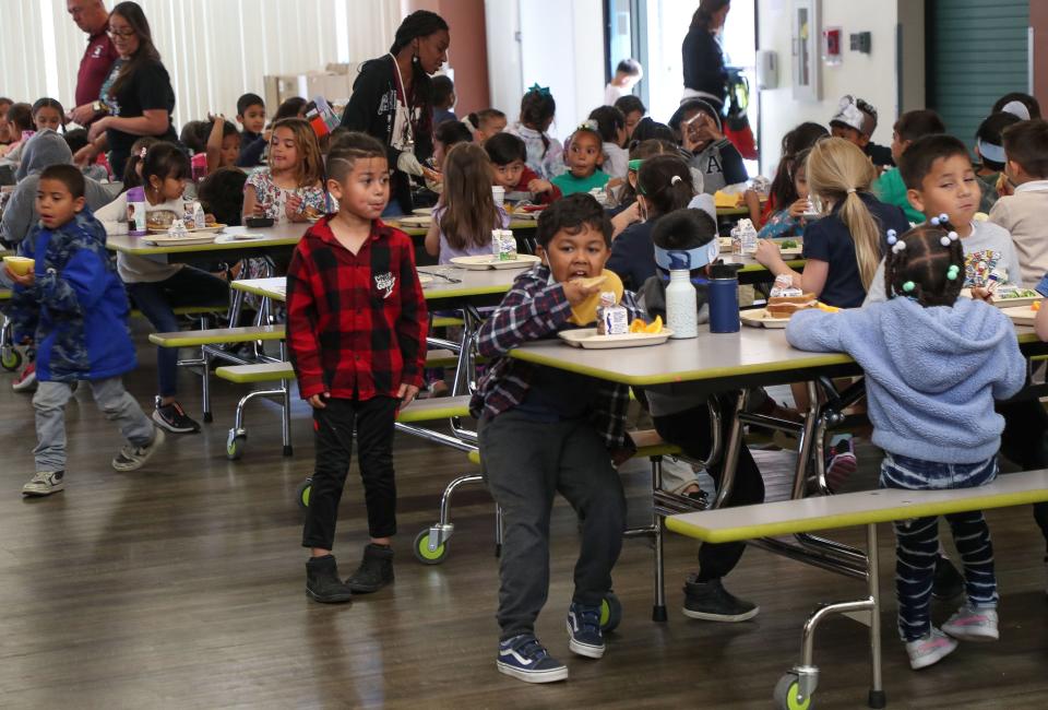 Students eat lunch at Cahuilla Elementary School in Palm Springs, Calif., March 30, 2023. 