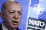 Turkey's President Recep Tayyip Erdogan speaks during a media conference at a NATO summit in Brussels, Monday, June 14, 2021. U.S. President Joe Biden is taking part in his first NATO summit, where the 30-nation alliance hopes to reaffirm its unity and discuss increasingly tense relations with China and Russia, as the organization pulls its troops out after 18 years in Afghanistan. (Yves Herman, Pool via AP)