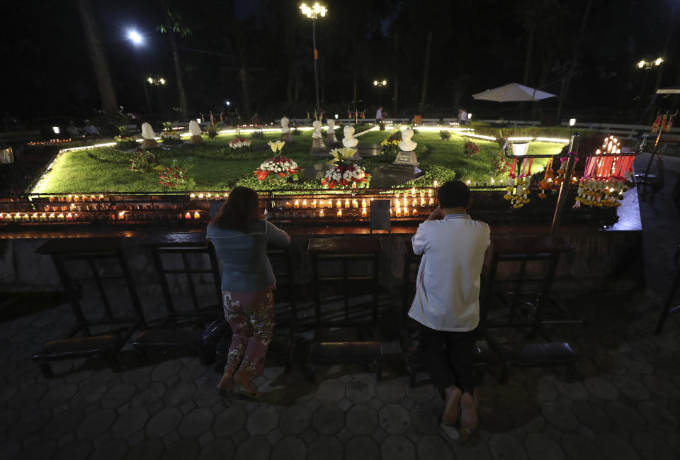 Catholic devotees pray at the seven martyrs cemetery during the 30th anniversary of the beatification of seven martyrs at the Songkhon village in Mukdahan province, northeastern Thailand. In 1940, seven villagers here were executed for refusing to abandon their Catholic faith, which Thai nationalists had equated with loyalty to France, whose colonial army in neighboring Indochina had fought Thailand in a brief border war. The seven were beatified in 1989 by Pope John Paul II, the first step to being named a saint. (AP Photo/Sakchai Lalit)