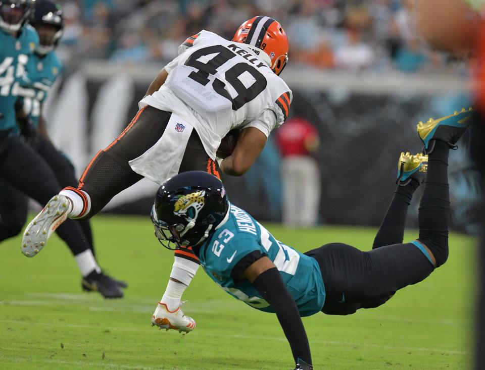 Jacksonville Jaguars cornerback C.J. Henderson (23) misses the tackle on Cleveland Browns running back John Kelly during early second quarter action. The Jacksonville Jaguars hosted the Cleveland Browns for their only home preseason game at TIAA Bank Field in Jacksonville, Florida Saturday night, August 14, 2021. The Browns led at the half 13 to 0.