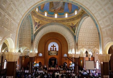 Egyptians attend the funerals of victims of the Palm Sunday bombings at St.Mina Coptic Orthodox Monastery "Deir Mar Mina" in Alexandria, Egypt April 10, 2017. REUTERS/Amr Abdallah Dalsh