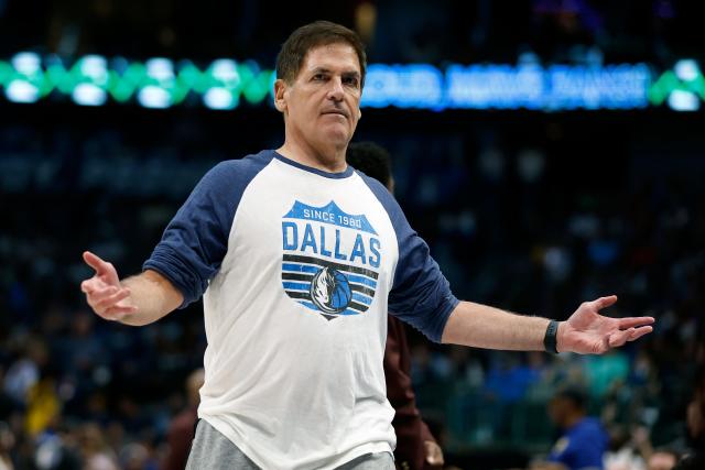 Dallas Mavericks owner Mark Cuban reacts during a timeout in Wednesday's game against the Golden State Warriors.