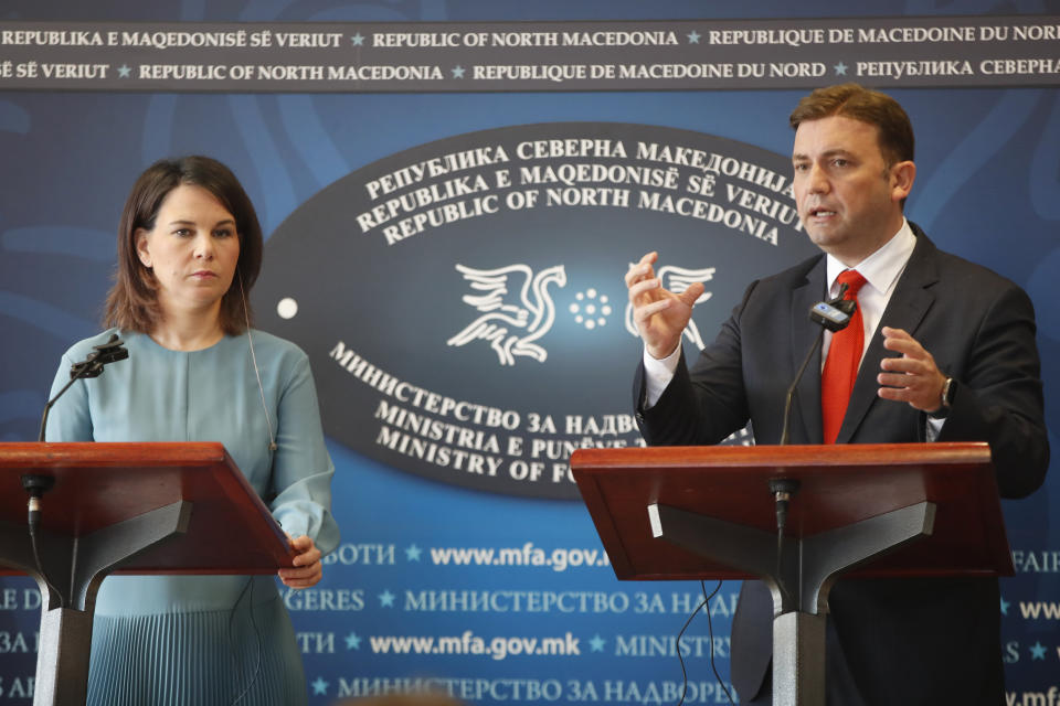 North Macedonia's Foreign Minister Bujar Osmani, right, speaks for the media during a joint news conference with German Foreign Minister Annalena Baerbock, at the foreign ministry in Skopje, North Macedonia, on Thursday, March 23. 2023. (AP Photo/Boris Grdanoski)