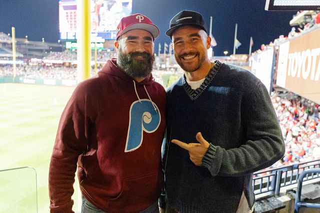 <p>Gabriella Ricciardi/MLB Photos via Getty </p> Jason Kelce (left) and Travis Kelce (right)