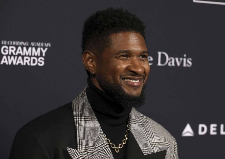 Usher arrives at the Pre-Grammy Gala And Salute To Industry Icons at the Beverly Hilton Hotel on Saturday, Jan. 25, 2020, in Beverly Hills, Calif. (Photo by Mark Von Holden/Invision/AP)