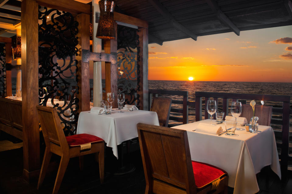 <p>Perhaps one of the best ways to experience dining in Barbados is at <a rel="nofollow noopener" href="http://www.daphnesbarbados.com" target="_blank" data-ylk="slk:Daphne's;elm:context_link;itc:0;sec:content-canvas" class="link ">Daphne's</a>, an inviting restaurant that defines waterfront luxury. Take in gorgeous views of the ocean as you dine in a warm-hued, elegant space. </p>