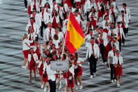 <p>TOKYO, JAPAN - JULY 23: Flag bearers Mireia Belmonte and Saul Craviotto of Team Spain take part in the Parade of Nations during the Opening Ceremony of the Tokyo 2020 Olympic Games at Olympic Stadium on July 23, 2021 in Tokyo, Japan. (Photo by Wei Zheng/CHINASPORTS/VCG via Getty Images)</p> 