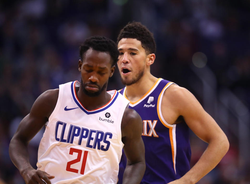 Patrick Beverley's fourth quarter foul on Devin Booker sent him packing from the game, and gave the Suns bench a chance to wave goodbye to him. (Mark J. Rebilas-USA TODAY Sports)