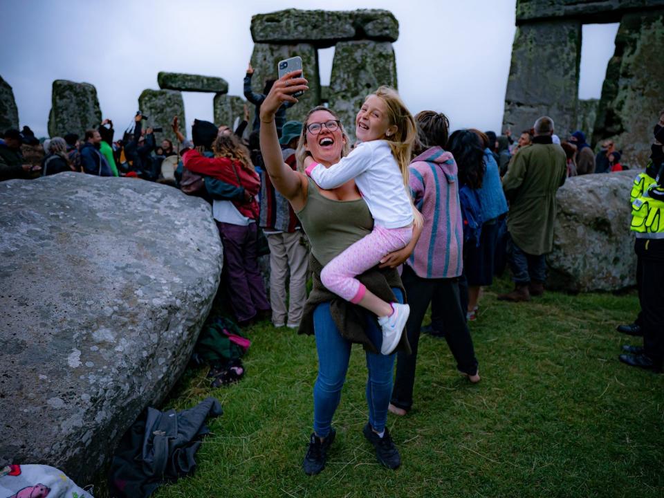 People celebrating the summer soltice in Stonehenge