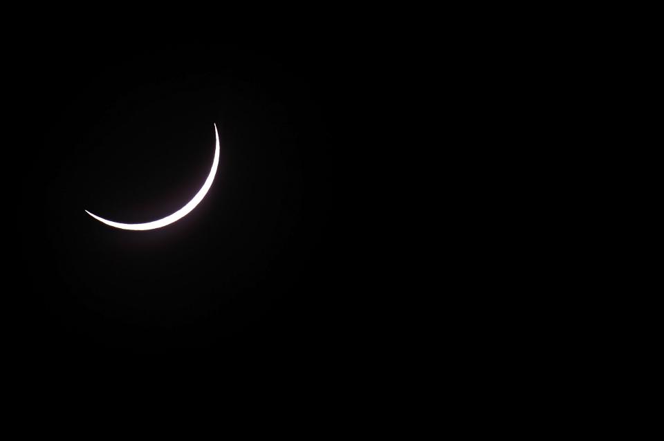 PALM COVE, AUSTRALIA - NOVEMBER 14: Near totality is seen during the solar eclipse at Palm Cove on November 14, 2012 in Palm Cove, Australia. Thousands of eclipse-watchers have gathered in part of North Queensland to enjoy the solar eclipse, the first in Australia in a decade. (Photo by Ian Hitchcock/Getty Images)