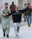 <p>An Afghan man reacts after a suicide bomb attack in Kabul, Afghanistan, Jan. 27, 2018. (Photo: Hedayatullah Amid/EPA-EFE/REX/Shutterstock) </p>