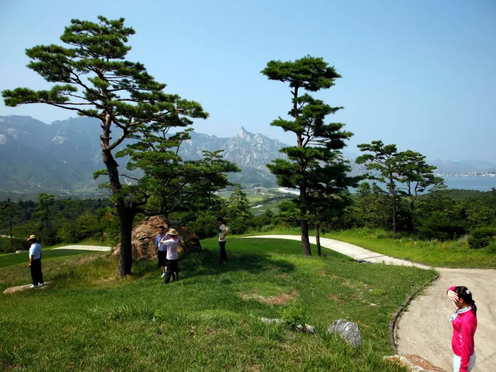 Visitors tour the South Korean-owned golf course at the Mount Kumgang resort, also known as Diamond Mountain, in North Korea on Sept. 1, 2011