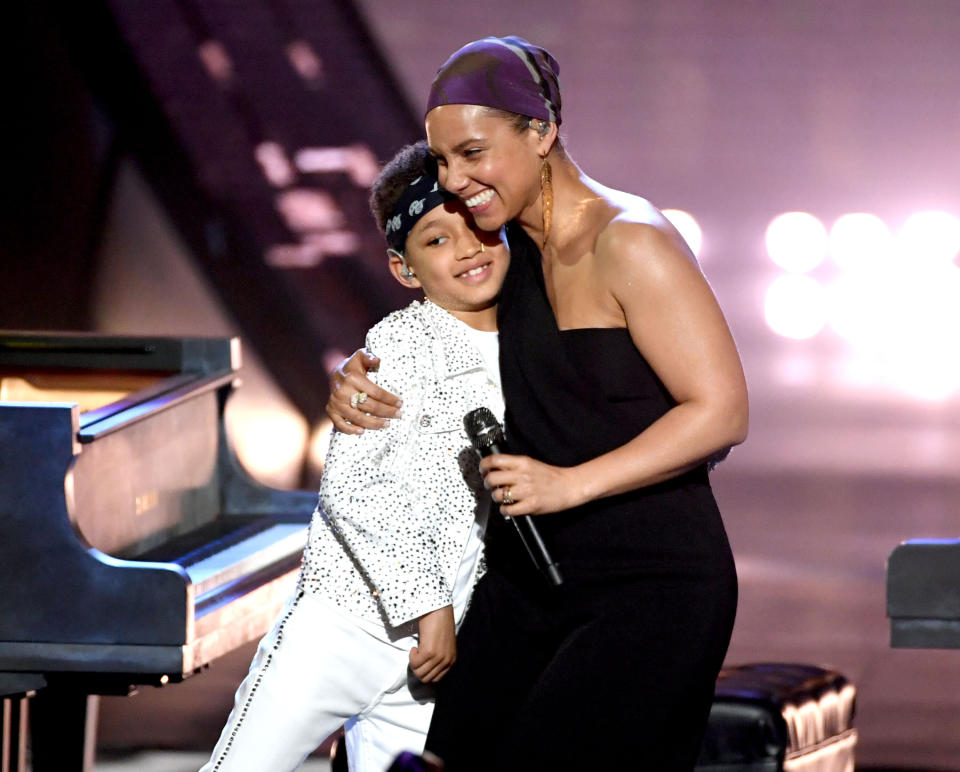 Keys and her son Egypt Daoud Dean perform onstage at the 2019 iHeartRadio Music Awards in Los Angeles. (Photo: Kevin Winter via Getty Images)