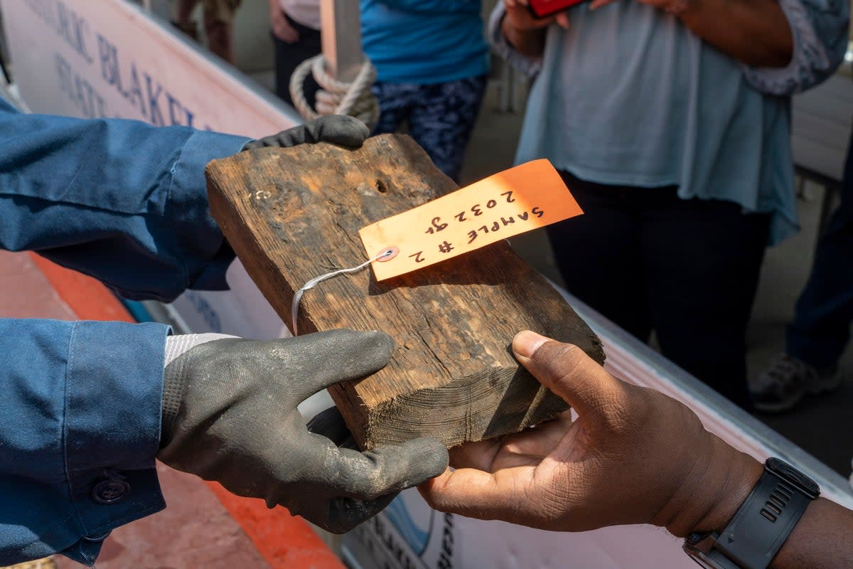 This photo shows artifacts from the Clotilda, the last known ship to bring enslaved people to the United States from Africa at Alabama Gulf Coast. The ship was discovered in 2019 (Daniel Fiore/Alabama Historical Commission via AP)