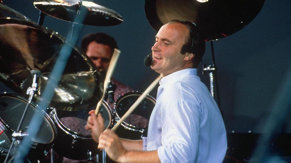Mandatory Credit: Photo by Shutterstock (173244am)Phil CollinsNordoff Robbins Music Therapy Concert at Knebworth, Britain - 1990.