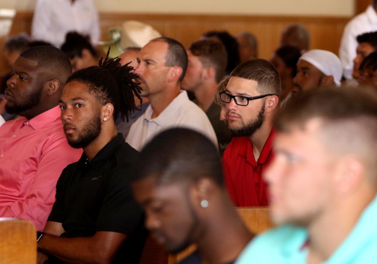 Midwestern State football players listen to during church service Saturday, Aug. 18, 2019, at Mt Pleasant Baptist Church.