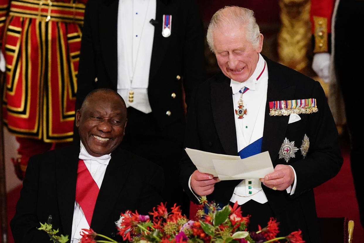 President Cyril Ramaphosa of South Africa, laughs as King Charles III speaks during the State Banquet held at Buckingham Palace, London, during the State Visit to the UK by the South African president. Picture date: Tuesday November 22, 2022.