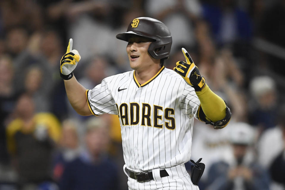 San Diego Padres second baseman Ha-Seong Kim (7) celebrates after hitting a solo home run during the fifth inning of a baseball game against Los Angeles Dodgers Tuesday, June 22, 2021, in San Diego. (AP Photo/Denis Poroy)