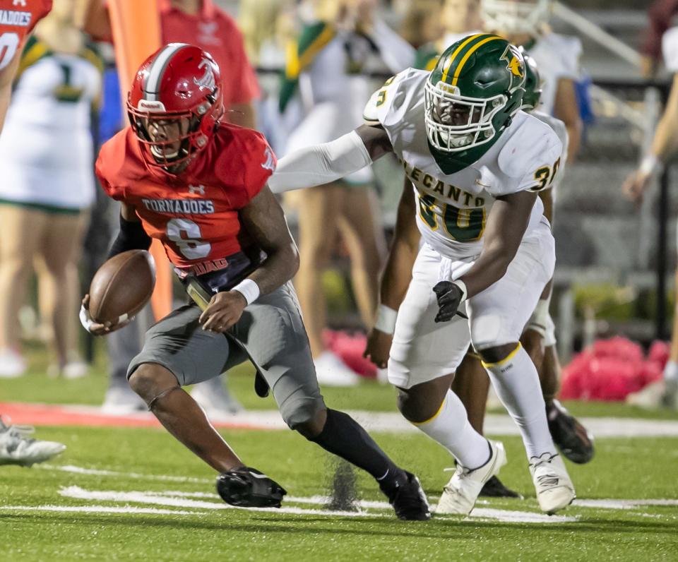 Bradford Dae'jon ”6ixx” shanks (6) tries to evade Lecanto Rahiem Rushing (30) as Bradford takes on Lecanto at Bradford High School in Starke, FL on Friday, October 20, 2023. [Alan Youngblood/Gainesville Sun]