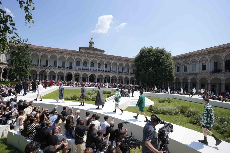 Models wear creations as part of the Valentino men's Spring Summer 2024 collection presented in Milan, Italy, Friday, June 16, 2023. (AP Photo/Luca Bruno)