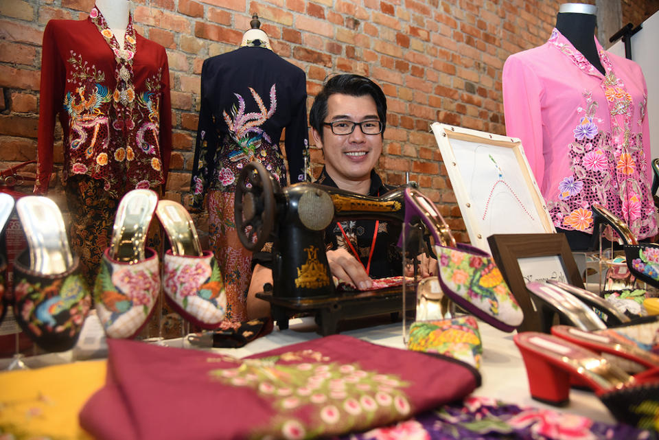 Kenny Loh and the Nyonya 'kebayas' and beaded shoes he made.