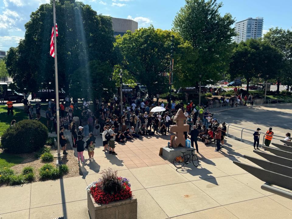 The rally for Samuel Sharpe and D'Vontaye Mitchell begins in Red Arrow Park Thursday afternoon. Sharpe was shot by police officers who were in town from Ohio for the Republican National Convention. Mitchell died June 30 after being held down by four security guards outside the Hyatt Regency.