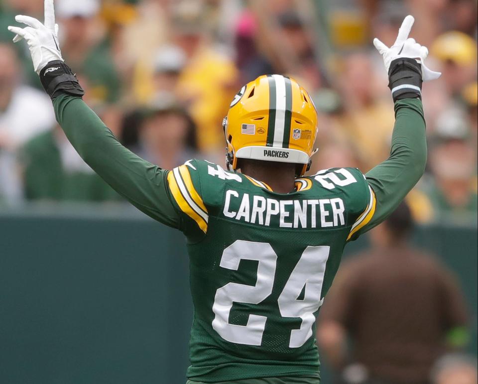 Green Bay Packers linebacker Tariq Carpenter (24) reacts after helping break up a pass intended for <a class="link " href="https://sports.yahoo.com/nfl/teams/seattle/" data-i13n="sec:content-canvas;subsec:anchor_text;elm:context_link" data-ylk="slk:Seattle Seahawks;sec:content-canvas;subsec:anchor_text;elm:context_link;itc:0">Seattle Seahawks</a> wide receiver Cade Johnson (88) during their preseason football game Saturday, August 26, 2023, at Lambeau Field in Green Bay, Wis. Green Bay defeated Seattle 19-15. Wm. Glasheen USA TODAY NETWORK-Wisconsin