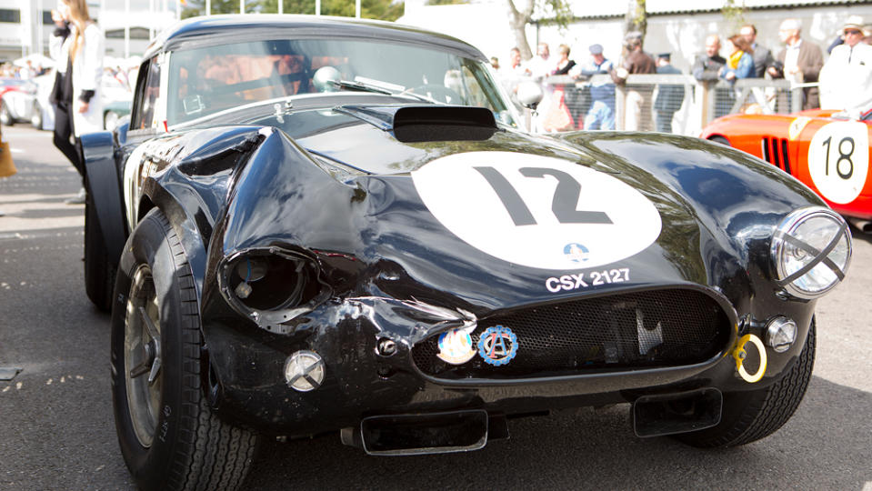 This 1963 AC Cobra shows off battle scars received during a race at the 2015 Goodwood Revival.