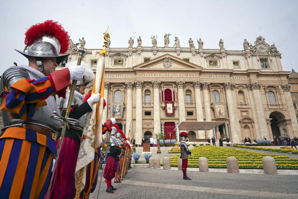 Swiss Guards stand attention as they wait for Pope Francis to preside over Easter Mass in St. Peter's Square at the Vatican, Sunday, April 21, 2019. (AP Photo/Andrew Medichini)