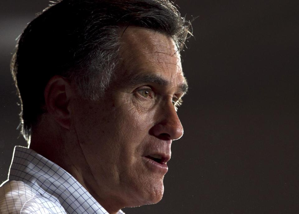 In this March 21, 2012, photo, Republican presidential candidate, former Massachusetts Gov. Mitt Romney addresses an audience during a campaign stop at an American Legion post in Arbutus, Md. It's a good thing the GOP presidential race slows down from here: The candidates are even more tired than the voters. And, boy, does it show. Romney scaled back his public schedule this week to get a break. He has slept in his own bed just twice since Christmas. (AP Photo/Steven Senne)