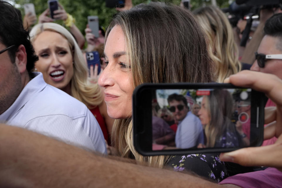 Karen Read, center, departs Norfolk Superior, Tuesday, June 25, 2024, in Dedham, Mass. Read is on trial, accused of killing her boyfriend Boston police Officer John O'Keefe, in 2022. Jury deliberations began in the trial Tuesday afternoon. (AP Photo/Steven Senne)