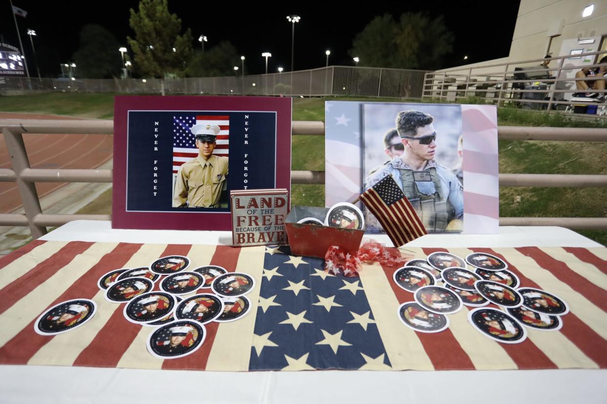 A display seeking contributions to the Hunter Lopez Memorial Scholarship Fund, seen during a football game at La Quinta High School in September.