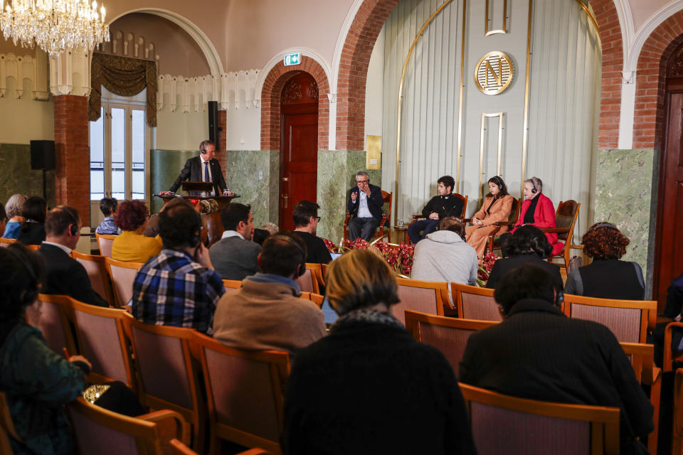 The husband and children of this year's winner of the Nobel Peace Prize, Ali, Kiana and Taghi Rahmani and the head of the Nobel Committee, Berit Reiss-Andersen, meets the press at the Nobel Institute in Oslo on Saturday, Dec. 9, 2023. Peace Prize winner Narges Mohammadi is imprisoned and is therefore represented by her immediate family. Mohammadi receives the peace prize for her fight against the oppression of women in Iran and the fight for human rights and freedom for all. (Frederik Ringnes/NTB via AP)