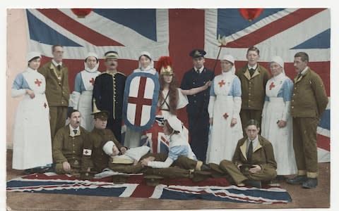 Britannia seen here with shield and wounded soldier, nurses and hospital staff - Credit: Reproduced with the permission of the British Red Cross Museum and Archives