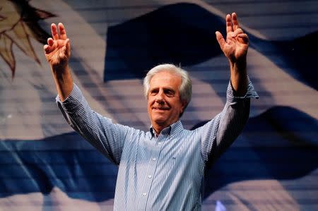 Tabare Vazquez, Presidential candidate for the ruling Frente Amplio, celebrates after giving a speech to supporters in Montevideo October 26, 2014. REUTERS/Andres Stapff