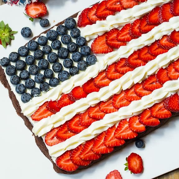 <p>The best kinds of flags have brownies hiding underneath.</p><p>Get the recipe from <a href="http://spicysouthernkitchen.com/brownie-flag/#_a5y_p=3904125" rel="nofollow noopener" target="_blank" data-ylk="slk:Spicy Southern Kitchen;elm:context_link;itc:0;sec:content-canvas" class="link ">Spicy Southern Kitchen</a>.</p>