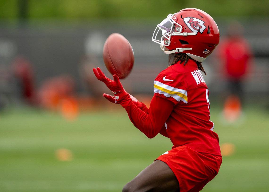 Kansas City Chiefs receiver Xavier Worthy attempts a catch during rookie minicamp on Saturday, May 4, 2024, at the team’s practice facility in Kansas City.