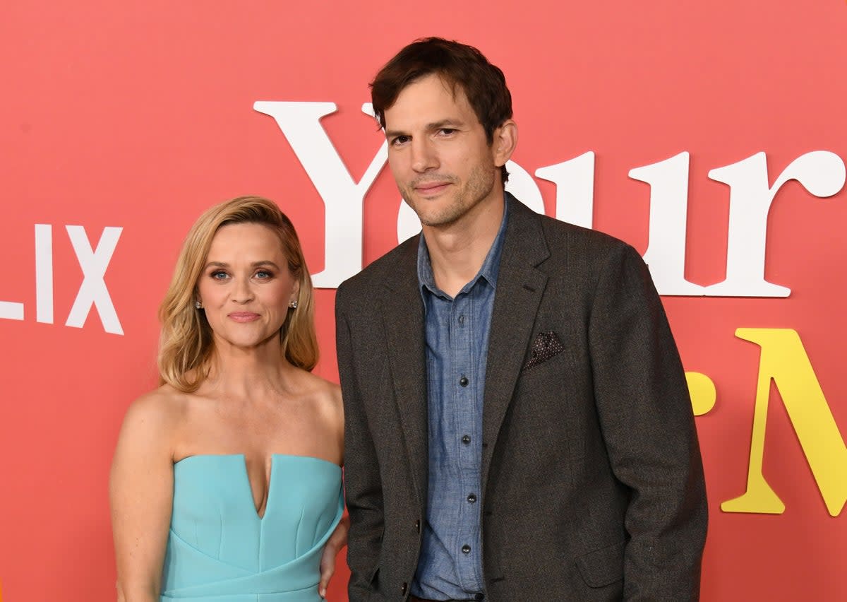 Reese Witherspoon and Ashton Kutcher on the red carpet at the world premiere of Netflix's Your Place Or Mine (Getty Images)