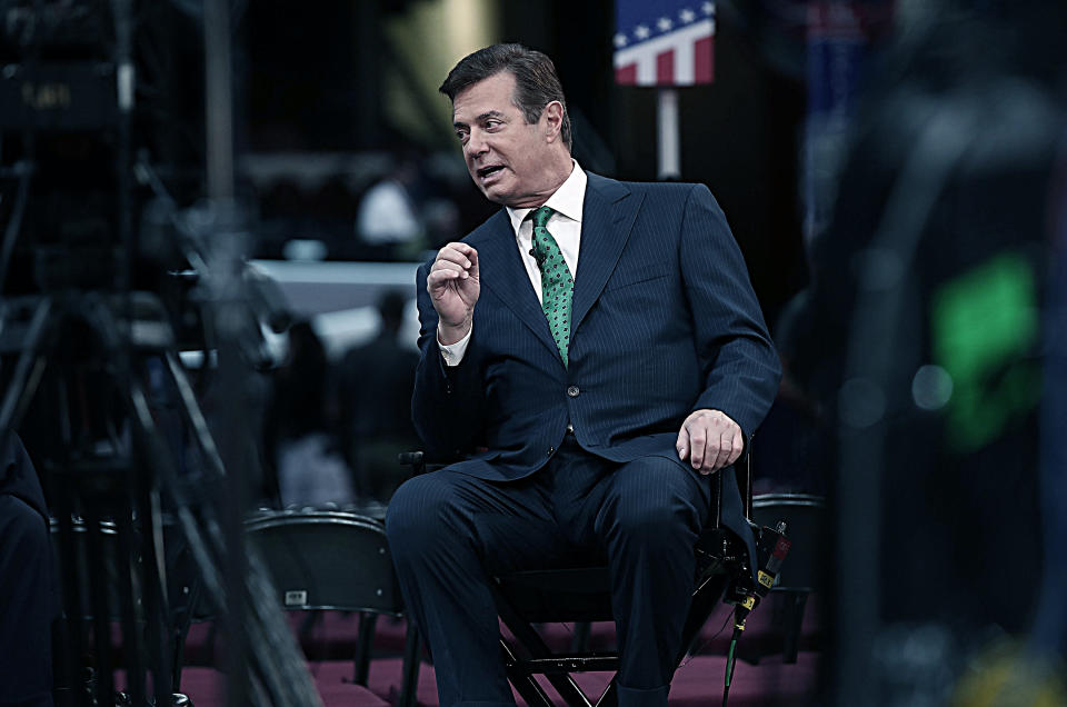 Paul Manafort, campaign manager for Republican presidential candidate Donald Trump, is interviewed on the floor of the Republican National Convention at the Quicken Loans Arena, July 17, 2016, in Cleveland. (Digitally enhanced photo: Win McNamee/Getty Images)