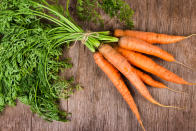 <p>According to a new <a rel="nofollow noopener" href="http://www.independent.co.uk/life-style/health-and-families/health-news/carrots-cooked-whole-better-at-fighting-cancer-1706917.html" target="_blank" data-ylk="slk:study;elm:context_link;itc:0;sec:content-canvas" class="link ">study</a>, boiling your carrots whole and cutting them up after cooking through is the best way to maintain nutrients (and will prove easier during the hectic prep).<br><br>Researchers at the University of Newcastle discovered that the vegetable can hold up to 25 per cent more of the anti-cancer compound, falcarino, if boiled whole. Now that’s food for thought… <em>[Photo: Getty]</em> </p>