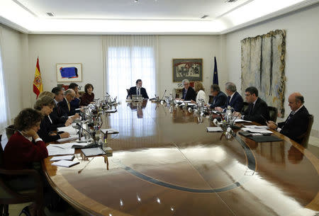 Spain's Prime Minister Mariano Rajoy heads a special cabinet meeting at the Moncloa Palace in Madrid, Spain, October 21, 2017. REUTERS/Juan Carlos Hidalgo/Pool