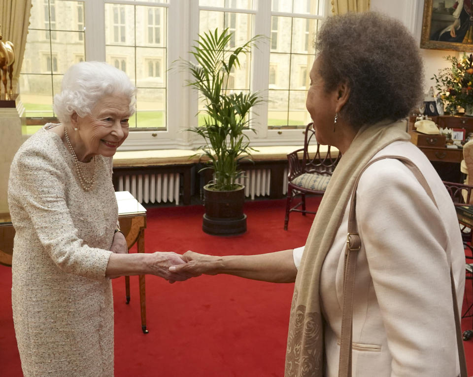 The Queen shakes hands with poet Grace Nichols
