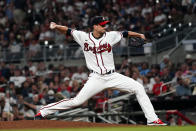 Atlanta Braves starting pitcher Charlie Morton (50) works in the fourth inning of a baseball game against the Philadelphia Phillies Tuesday, Sept. 28, 2021, in Atlanta. The Braves won 2-1 giving Morton the victory. (AP Photo/John Bazemore)