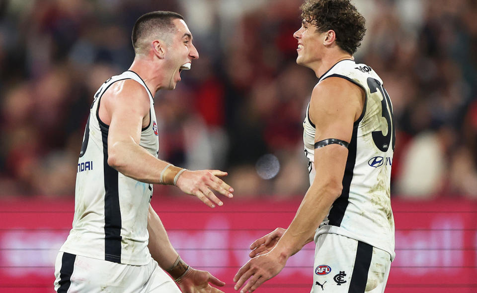 Jacob Weitering and Charlie Curnow, pictured here after Carlton's win over Melbourne.