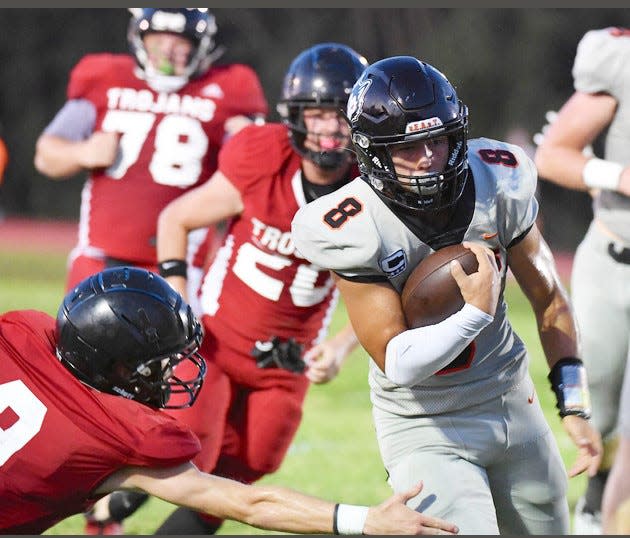 Pawhuska High's Deacon Hendren, No. 8, slices out extra yards against Caney Valley High during football action on Aug. 25, 2023, in Ramona. Pawhuska won, 82-0, while playing its jayvee in th second half.