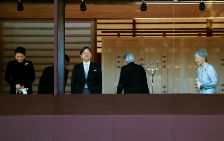 FILE PHOTO : Japan's Emperor Akihito and Empress Michiko walk behind Crown Prince Naruhito and Crown Princess Masako after a public appearance for New Year celebrations at the Imperial Palace in Tokyo, Japan, January 2, 2019. REUTERS/Issei Kato/File Photo