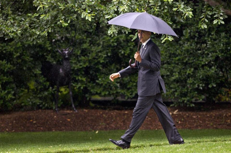 President Barack Obama walks on the South Lawn of the White House in Washington, Tuesday, June 12, 2012, to board the Marine One, for campaign stops in Baltimore and Philadelphia. (AP Photo/Manuel Balce Ceneta)