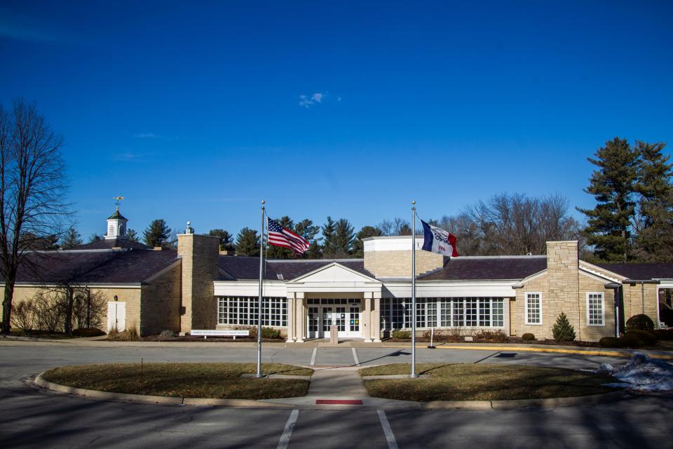 Flags fly in front of the Herbert Hoover Presidential Library-Museum on Thursday, Jan. 3, 2019, at the Herbert Hoover National Historic Site in West Branch, Iowa.