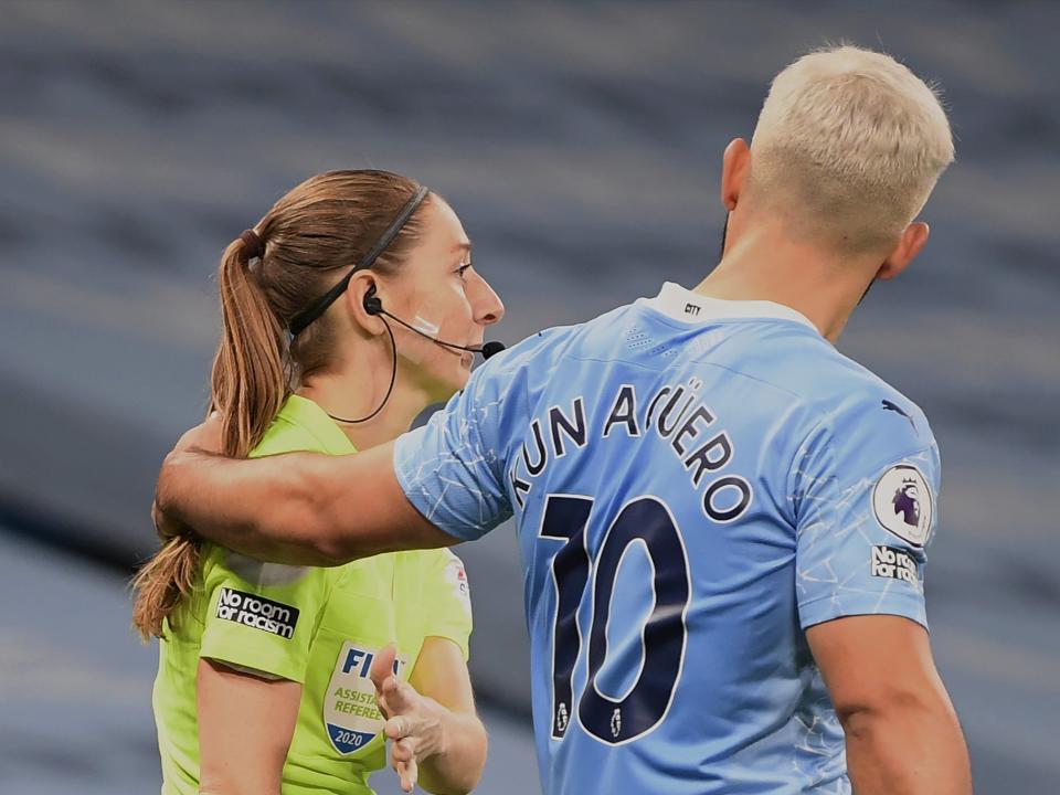 Assistant referee Sian Massey-Ellis and Sergio AgueroGetty