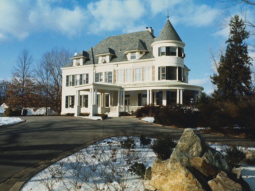 Number One Observatory Circle at the US Naval Observatory. A white house with a gray roof.